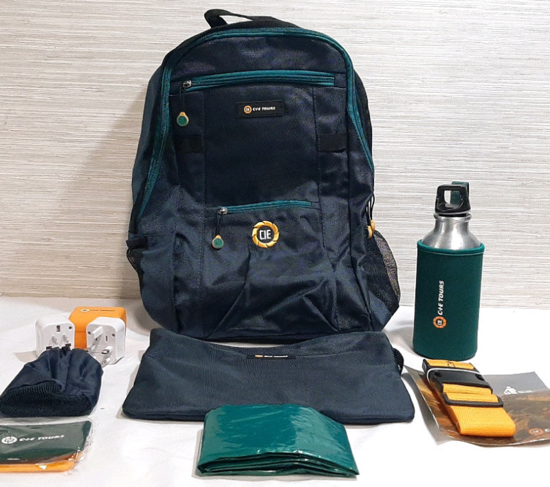New CIE Tours Backpack (16&frac12;"X12") With Accessories, Including A Stainless Steel Water Bottle (8&frac12;") with Fabric Holder, Mesh Zip Bag (11&frac12;"X8&frac12;"), North American to EU Charger Ports with Plastic Case, 2 Clip On Luggage Tags, Yellow Strap & Rain Poncho with S