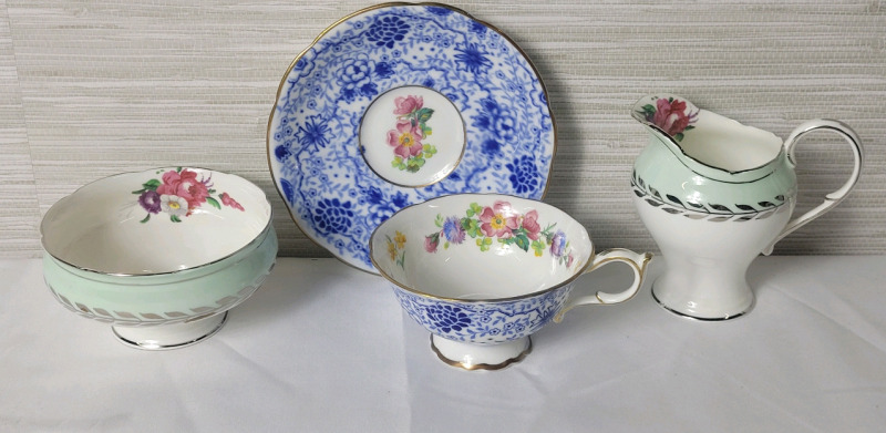 Paragon Cup & Saucer & Paragon Double Warrant Cream and Sugar . Cup and Saucer ring true