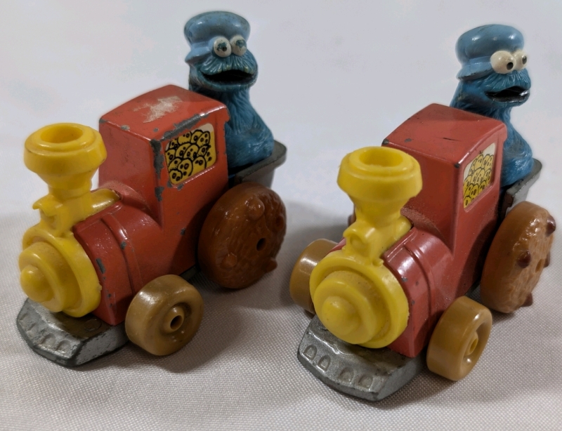 1981 2 Vintage Cookie Monster Trains 1981 Diecast Toy Car Sesame Street Muppets
