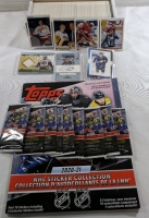 NHL Hockey Lot Of 1990-91 Upper Deck Complete Trading Card Set, Topps 2020-21 NHL Sticker Book With 10 Sticker Packs, 5 Canada NHL Stamps And 2 Single Trading Cards
