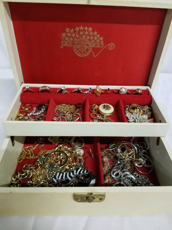 Vintage jewelry box with contents