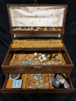 Vintage jewelry box with contents