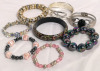 8 Large Beaded Bracelets