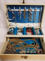 Vintage jewelry box with contents