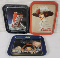 Three (3) Coca-Cola Serving Trays . Measures 11"&times;14.5" to 13 1/4"&times;10 1/4"