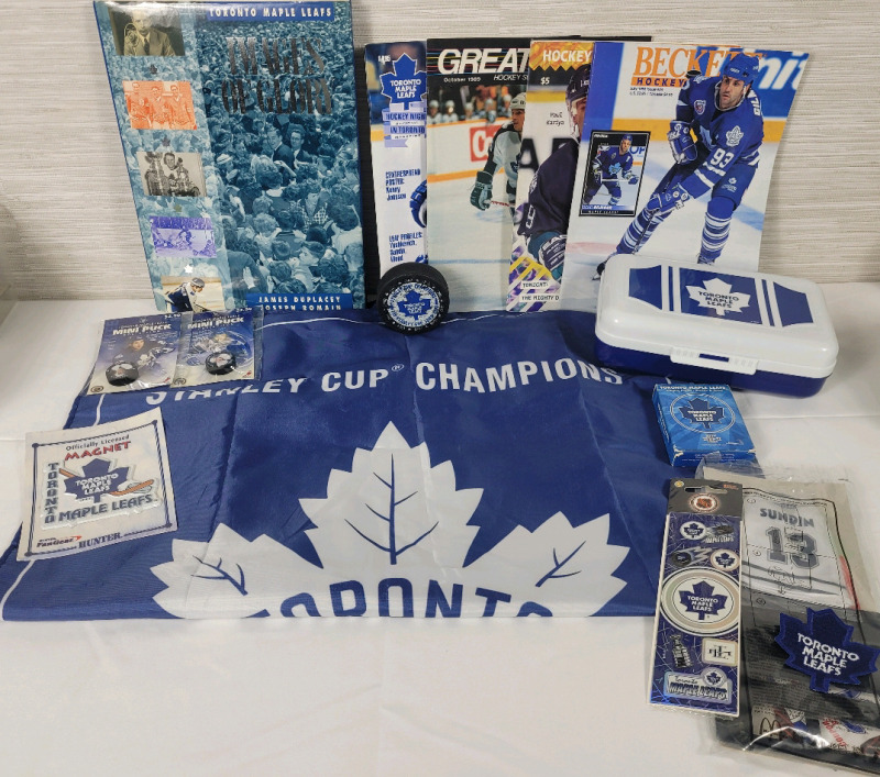 Toronto Maple Leafs Fan Memorabilia Lot . Leafs Book , Mini Player Pucks , Playing Cards , Pencil Case , Magazines , Leafs Stanley Cup Banner 23"×34" plus more