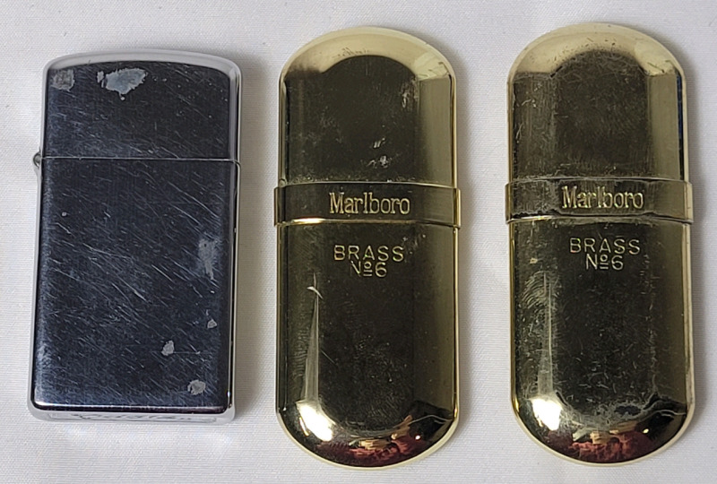 1979 ZIPPO Slim Lighter , Made in Bradford PA & Two (2) Vintage Marlboro Brass No. 6 Lighters