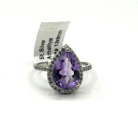 Sterling Silver Natural Amethyst (4ct) with CZ (0.35ct) Ring, Size 7, W/A $500.00. Amethyst is the birthstone for February.