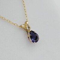 10KT Yellow Gold Natural Iolite (0.50ct) and Natural Moonstone (0.04ct) with Gold Plated Sterling Silver Chain, W/A $600.00.