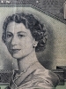 1954 Canadian Bank of Canada " Devils Face " One Dollar Bank Note . Has been in circulation - 2