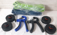 Lot of Excercise Products, Including 2 New UrbanFit Excersice Bands (50-125lb & 60-175lb), 2 Hand Grip Strengtheners & 4 Jack Pad Pucks