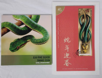 2013 Canadian Fine Silver $20 Twenty Dollar " Year of the Snake " Coin & 1st. Day Issue Year of the Snake Stamp . Coin is Uncirculated