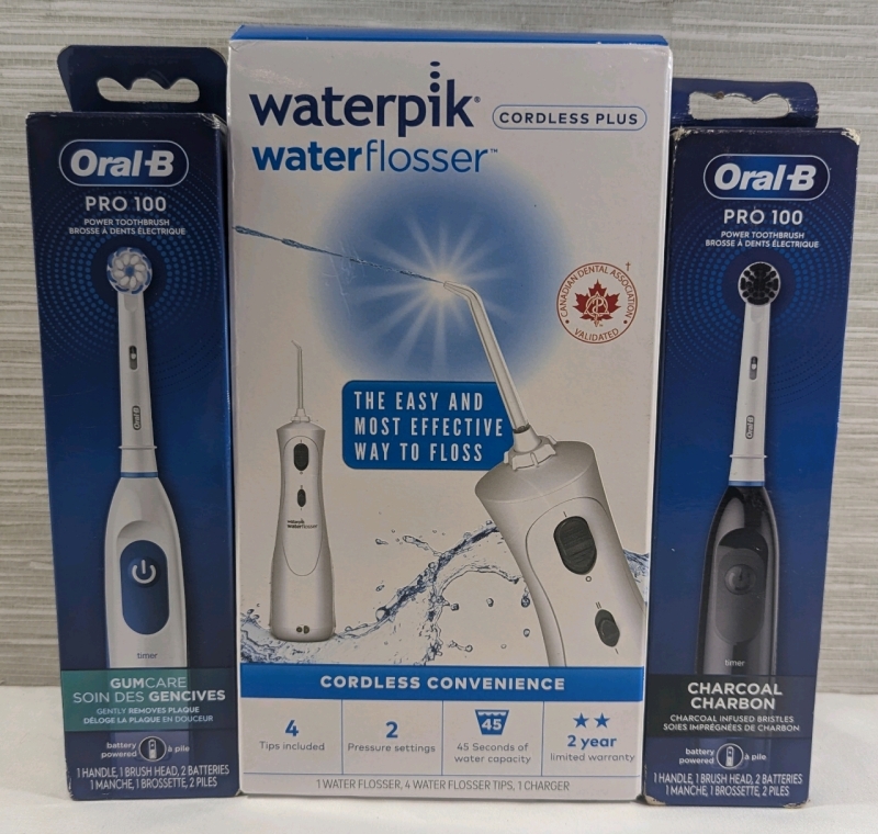 New Waterpik Cordless Plus - Waterflosser - Box Has Damage and 2 Oral-B - Pro 100 Electric Toothbrushes - 1 Brush Infused With Charcoal - 1 Brush is Sensitive Gum Care