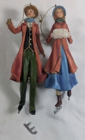 2 Christmas Ornaments - Male and Female Skaters - Man Has Small Damage That Can Easily Be Reglued