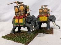 2 Resin Elephant Figures with 3 (Total) Lead Riders. 3.75" Tall. On Flocked Base. Hand-painted