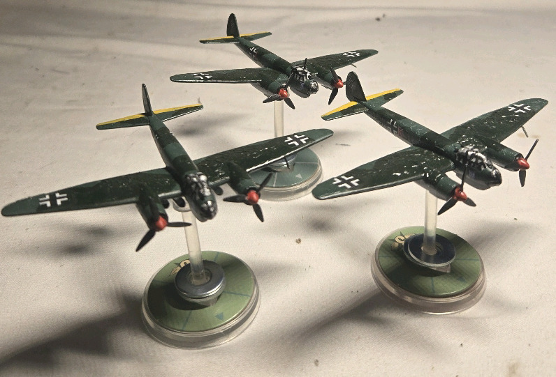 3 Plastic German Hand-painted Airplane Miniatures on Plastic Stands | Appears to be painted as a JU 88 Bomber Plane Squadron| Likely from Blood Red Skies Wargame 2&frac34;" Long 2" Tall