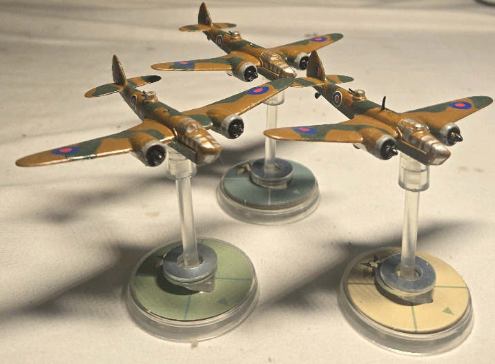 3 Plastic British Hand-painted Airplane Miniatures on Plastic Stands | Appears to be painted as a Bristol Blenheim Bomber Squadron | Likely from Blood Red Skies Wargame 2&frac12;" Long 2" Tall