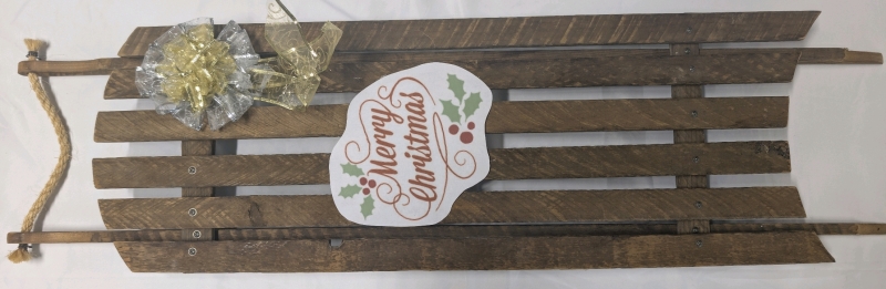 Vintage Sled Used As A Hanging Christmas Decoration