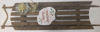 Vintage Sled Used As A Hanging Christmas Decoration
