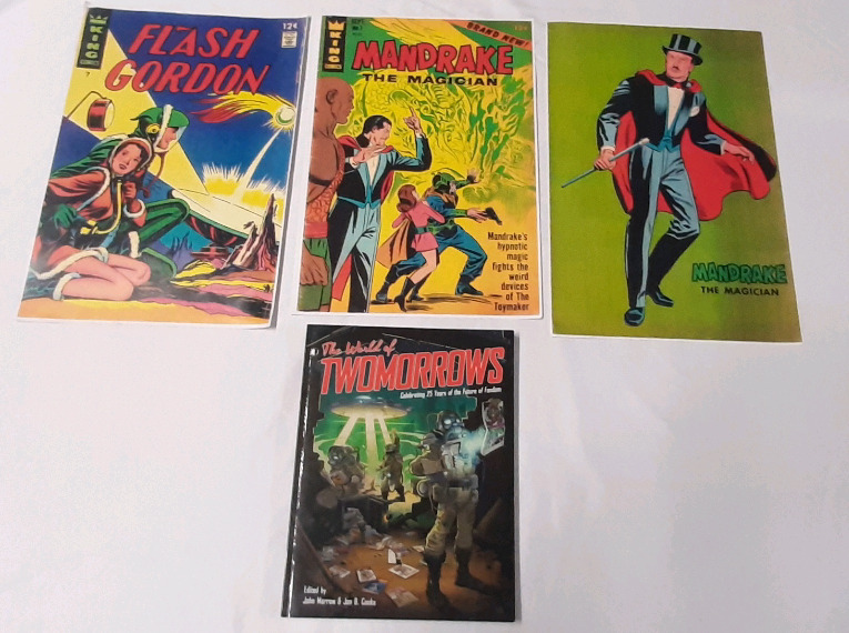 Lot of 3 Oversized Comic Book Prints (16"X11") and A Paperback Copy of The World of Twomorrows Edited by John Morrow & Jon B. Cooke