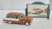 Road Champs Fabulous 1955 Pontiac Safari Station Wagon Diecast 5" Long with Plastic Sign 4.75" Long. Missing front Right Headlight Lens.