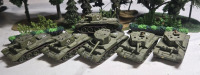 ( 6 ) Appears To Be Plastic Welsh Tanks | Includes But Isnt Limted To ( 4 ) Cromwell Tanks & ( 2 ) Armored Heavy Cromwell Tanks | Largest Measures 4" x 1½" * Shrubbery Not Included *