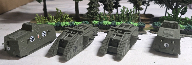 ( 4 ) Appears To Be Plastic German Tanks | Includes WW1 Mark IV Tank, & WW1 A7V Tanks | Largest Measures 3" x 1¼" * Shrubbery Not Included *