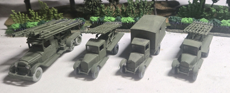 ( 4 ) Appears To Be Plastic British Rocket Launcher Trucks & Supply Truck| Includes BM13's & a Suppy Truck | Measures 3 5" x 1½" * Shrubbery Not Included *