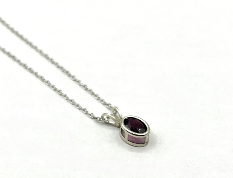 Sterling Silver Natural Garnet Pendant With Sterling Silver Chain, Retail $300.00. Garnet is the birthstone for January.