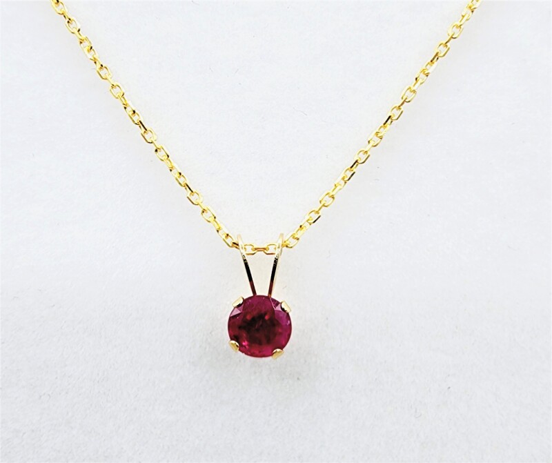 10KT Yellow Gold Natural Enhnaced Ruby Pendant With Gold Plated Sterling Silver Chain, Retail $400.00. Ruby is the birthstone for July.