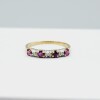 10KT Yellow and White Gold Natural Rubies (0.40ct) with Diamond (0.03ct) Ring, Size 6, W/A $1100.00. Ruby is the birthstone for July.