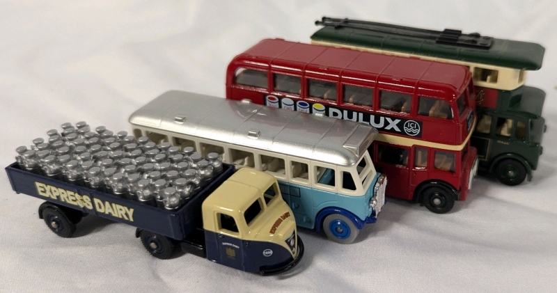 4 Model Vehicles of the "Days Gone" Line by Lledo. Longest Measures 3.75"