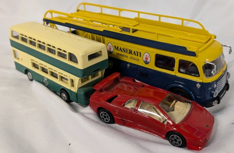 Melosul Diecast Bus (4.5"), Bburago Diecast Lamborghini (1/43) and Old Cars Maserati Vehicle Transport Truck (1/43)