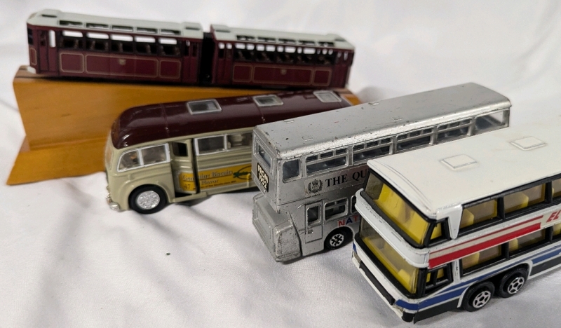 4 Collectible Diecast Modles of Public Transport. Includes Glago, Dinky, Superior and Hong Kong Tourist Association. Hong Kong Model Base Measures 9" Long.