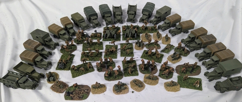 38 hand-painted Sets of Plastic Soldier Miniatures and 22 Hand-painted Plastic and Resin Vehicles. Soldiers 1" Tall on Flocked Base.