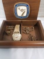 Small wooden box with men's jewelry