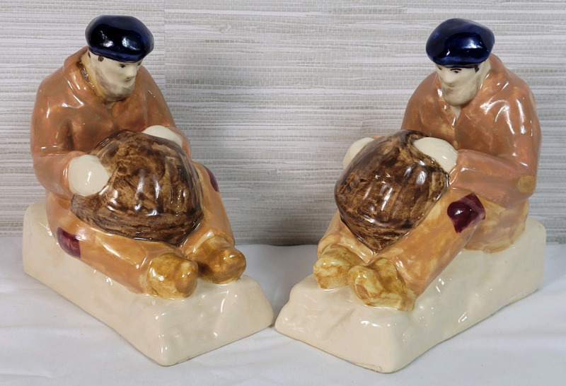 Vintage French Quimper Faience Pottery Bookends (pair) , attributed to Adrien Ravallec for HB-Henriot . Measures 5.5"×3"×6" . Small crack near foot