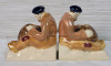 Vintage French Quimper Faience Pottery Bookends (pair) , attributed to Adrien Ravallec for HB-Henriot . Measures 5.5"&times;3"&times;6" . Small crack near foot - 3
