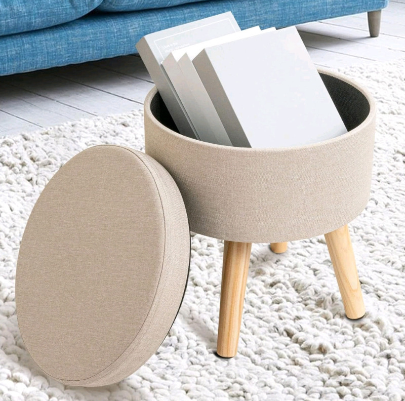 New - Miereirl Storage Ottoman Footrest . Measures 14" tall & 12.5" diameter . Some Assembly Required , stock photos used