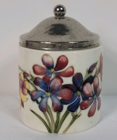 Moorcroft Pottery Tea Cannister w/Lid . Measures 4 3/4" tall . Crazing present