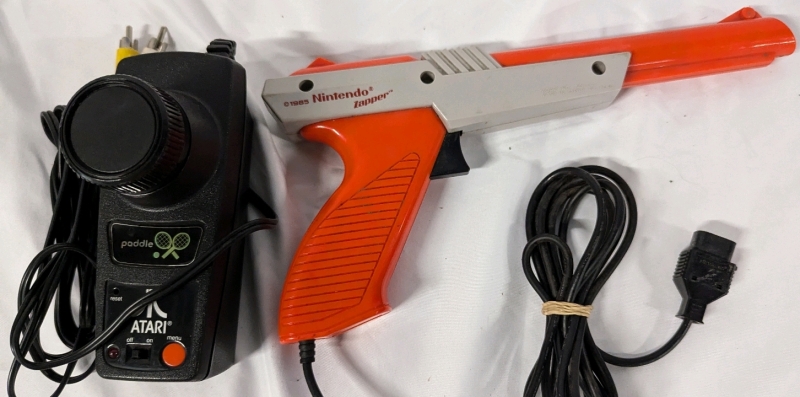 Nintendo Zapper Light Gun, with Atari Plug It In And Play Paddle.