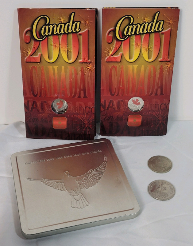 Canadian Coin & Stamp Lot . Two (2) Canada 2001 Colored Quarters (Uncirculated) , 1999/2000 Millennium Stamp/Coin Set & Two (2) Canadian Tokens