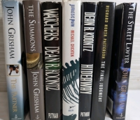 7 Hardcover Books Incl Jurassic Park, Dean Koontz, John Grisham +