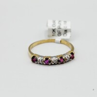 10KT Yellow and White Gold Natural Ruby (0.40ct) and Diamond (0.03ct) Ring, Size 6, W/A $1100.00. Ruby is the birthstone for July.