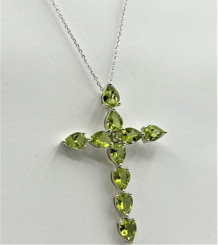 Sterling Silver Natural Peridot (11ct) Cross Pendant With Sterling Silver Chain, W/A$825.00. Peridot is the birthstone for August.