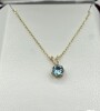 10KT Yellow Gold Natural Blue Topaz (0.50ct) Pendant With Gold Plated Sterling Silver Chain, W/A $580.00.