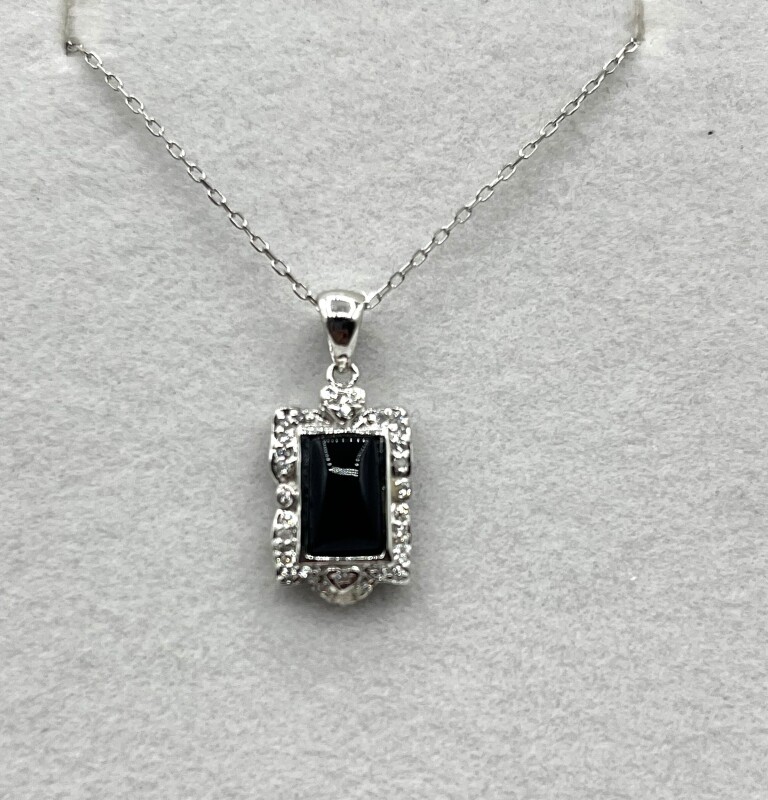 Sterling Silver Black Onyx and CZ Pendant with Sterling Silver Chain, Retail $200.00.