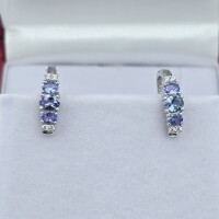 Sterling Silver Natural Tanzanite (1.6ct) and CZ (0.20ct) Earrings, W/A $645.00. Tanzanite is the birthstone for December.