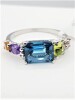 14KT White Gold Natural Blue Topaz (2.25ct), Amethyst (0.15ct), Golden Beryl (0.12ct) Peridot (0.42ct) Pink Tourmaline (0.11ct) and Diamond (0.04ct) Ring, Size 6.5, W/A $2390.00.