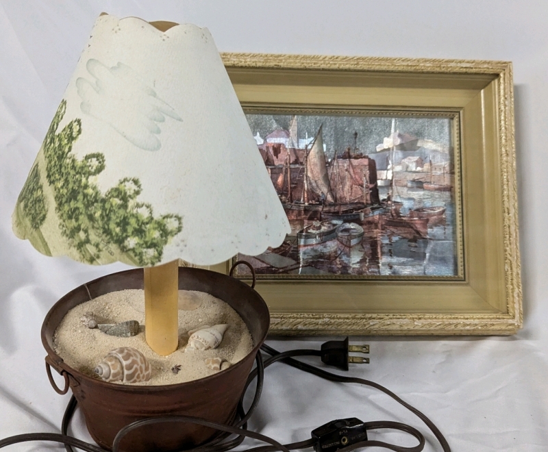 Waterfront Lover's Lot. Beach Themed Sand Lamp and Framed Metallic Boat Print. Frame Measures 9.5" by 11.5".